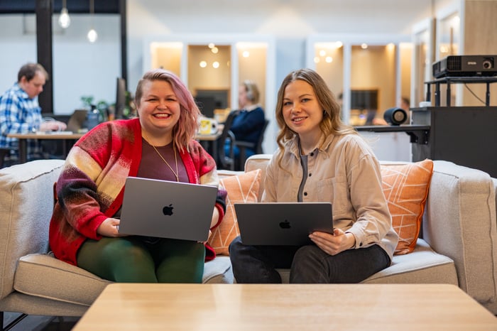 Compoze Labs team members collaborating in the office